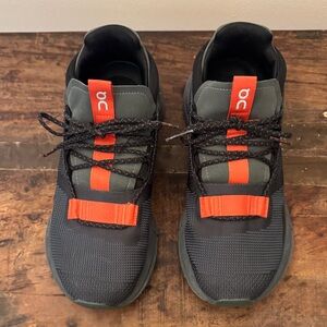 On Running Women’s Black and Orange Athletic Shoes